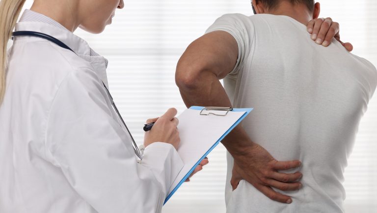 injured spine, back injury, doctor physio Swindon Personal Injury Solicitors